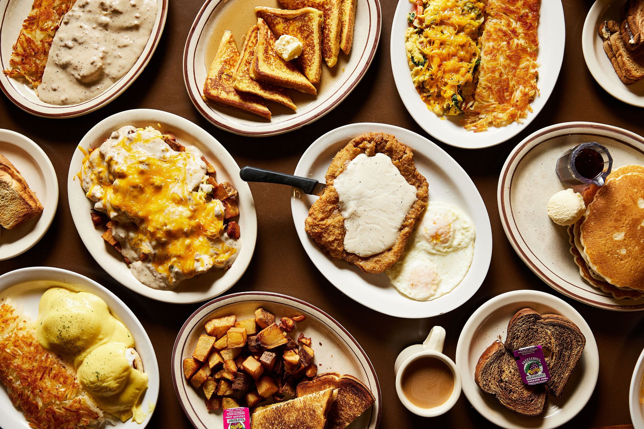 Breakfast plates at Burs including chicken fried steak and eggs