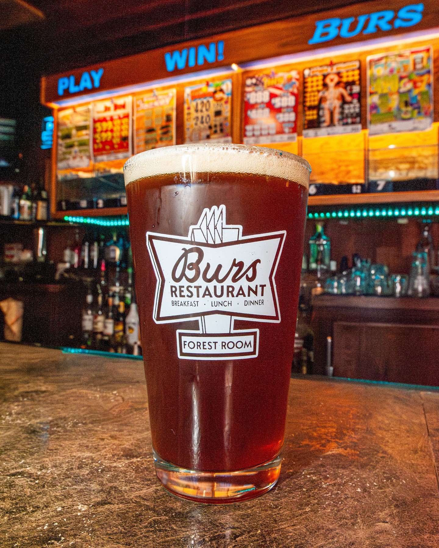 Burs Forest Room pint glass on the bar