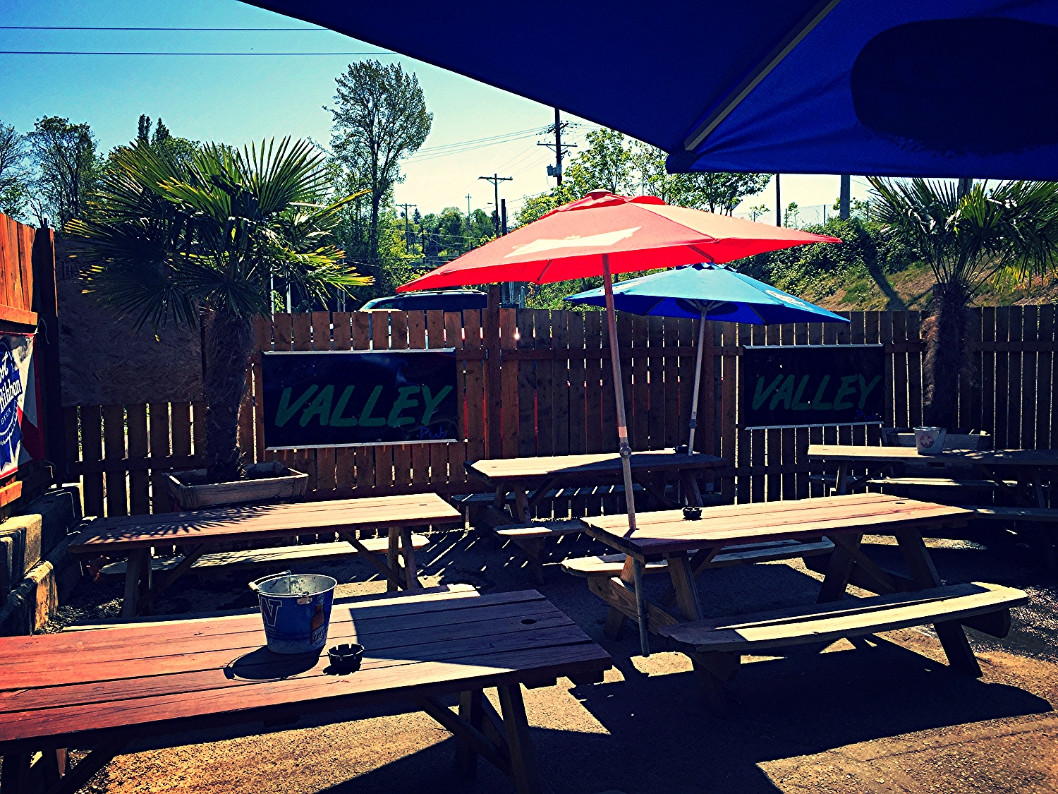 Sunny patio with picnic tables